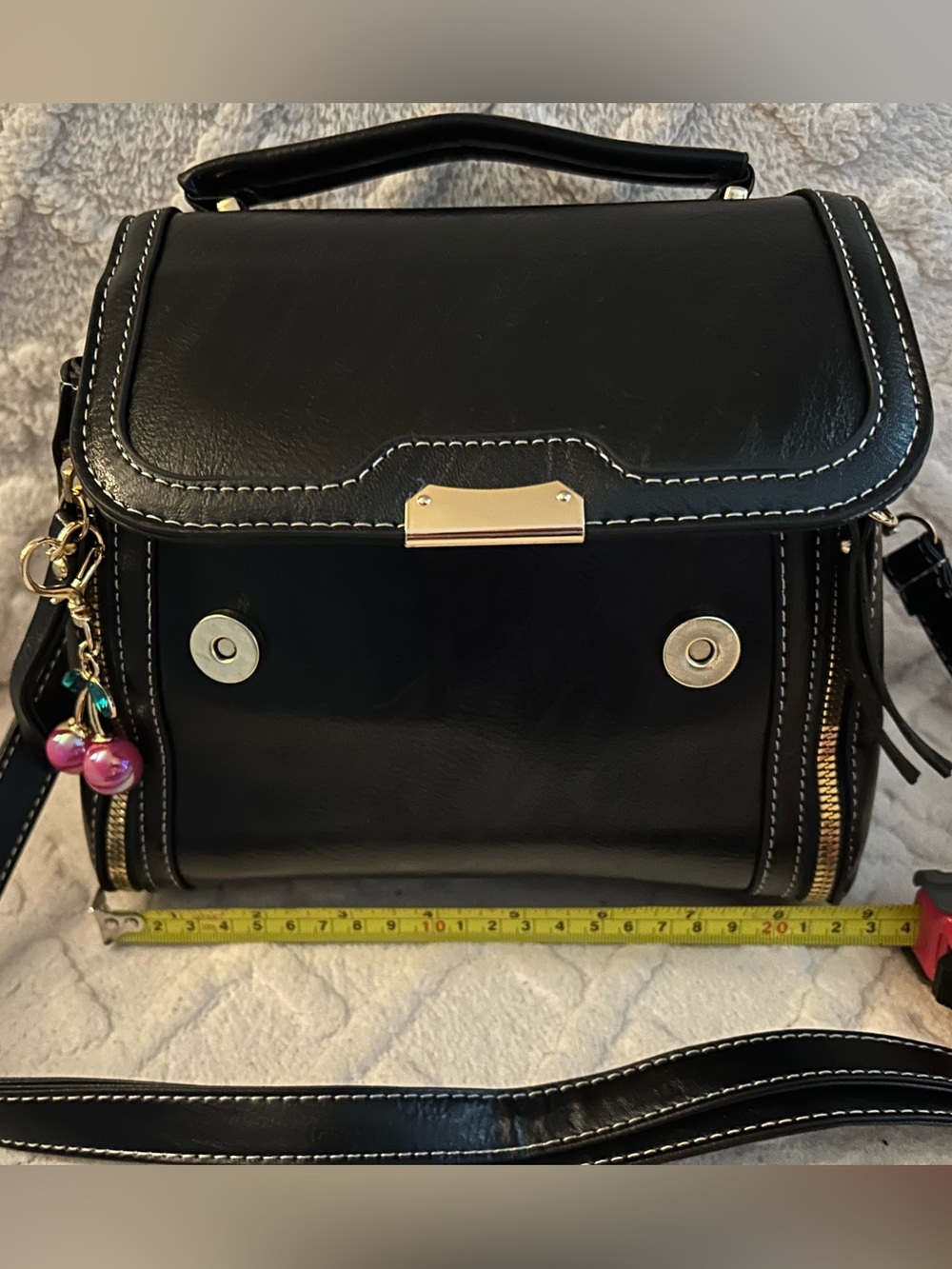 Structured Black Satchel with Gold Hardware and Contrast Stitching